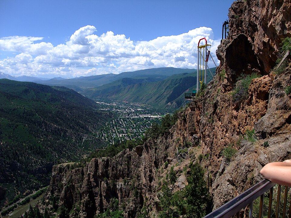 Mountain-top amusement park with scenic canyon views