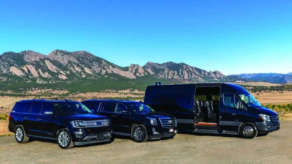 Arion SUV and Sprinter fleet lineup below the Flatirons — Denver corporate transportation