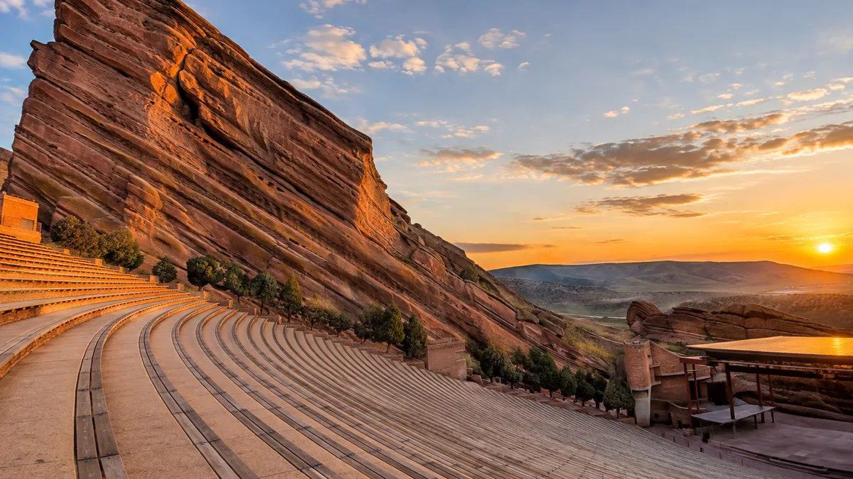 the Trading Post road winding among red sandstone formations at Red Rocks Park