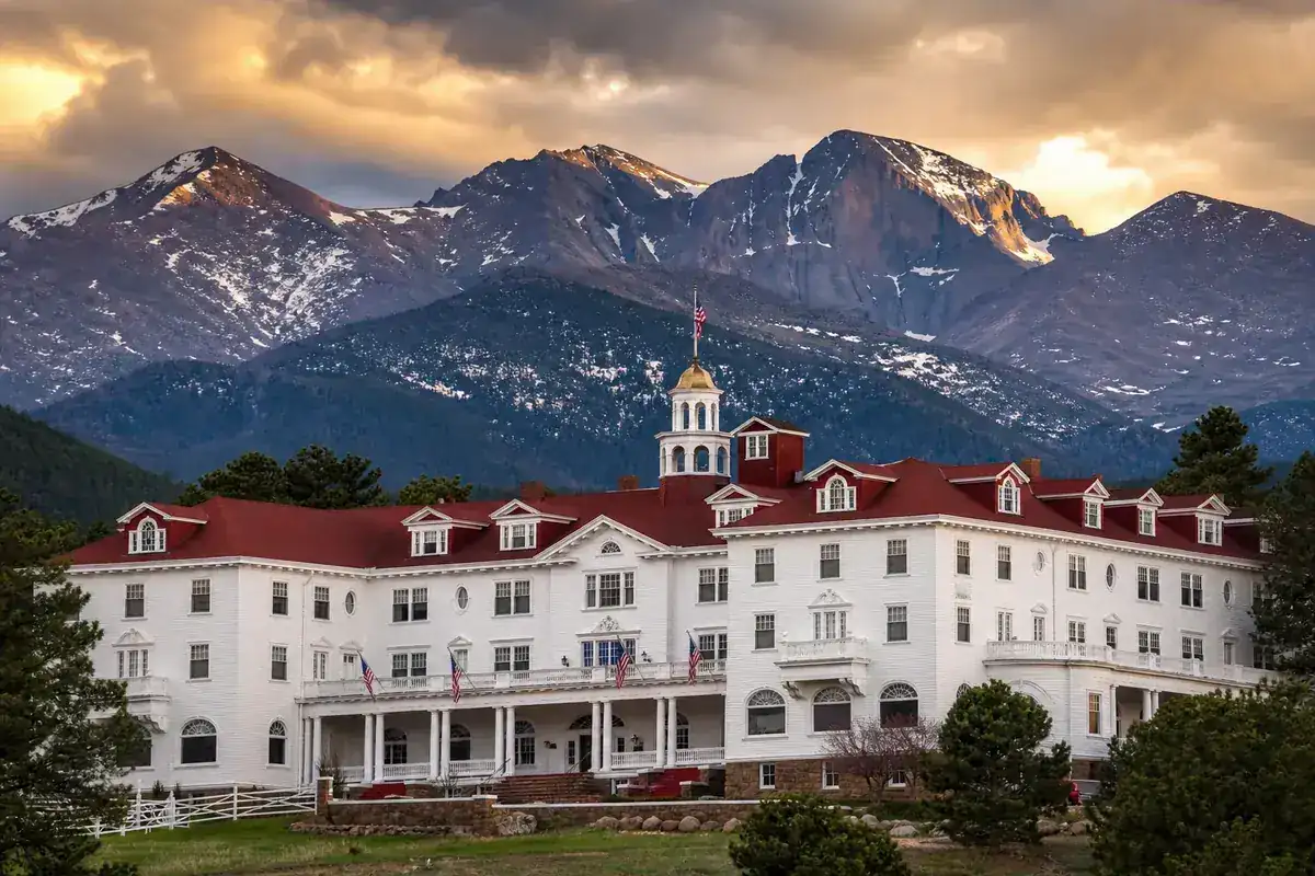 The Stanley Hotel below Longs Peak in Estes Park — Arion car service from Denver