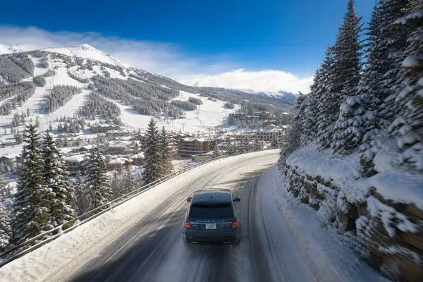 Luxury SUV at a Colorado ski resort in winter